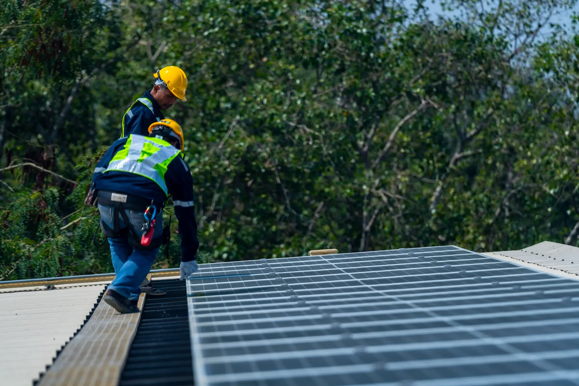 Solar Center technicians installing solar panels on a California home